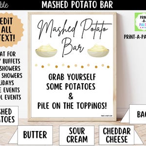 May include: A framed sign with the words "Mashed Potato Bar" in elegant script. The sign includes illustrations of mashed potatoes and encourages guests to "Grab yourself some potatoes & pile on the toppings!" Additional signs list toppings like bacon, butter, and sour cream.