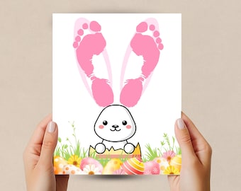 May include: A white bunny rabbit with pink footprint ears holding a basket of colorful Easter eggs. The bunny is surrounded by green grass and yellow flowers.
