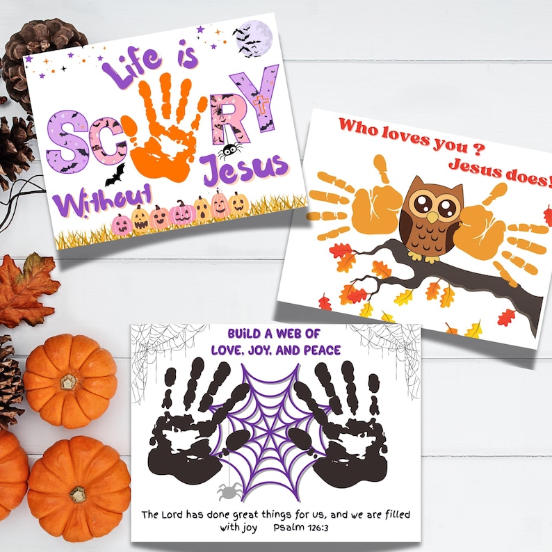 May include: Three rectangular craft sheets featuring handprint art. One reads Life is Scary Without Jesus with an orange handprint, pumpkins, and bats. Another shows an owl with handprint wings and Who loves you? Jesus does!. One features a spiderweb.