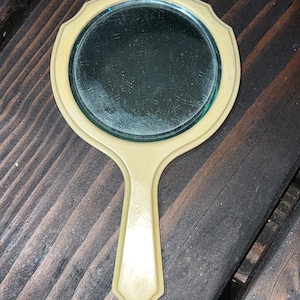 Vintage Yellow Celluloid Hand Mirror Beveled Glass in Yellow Celluloid Frame