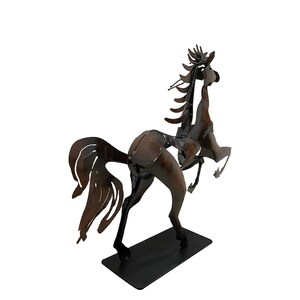 May include: A brown metal horse sculpture with a detailed mane and tail. The horse is standing on its hind legs with its front legs raised. The sculpture is on a black metal base.