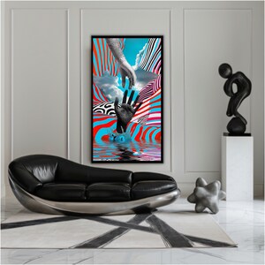 May include: Abstract art print featuring hands reaching out over a water reflection. The artwork uses bold colors like red, blue, and black with striped and patterned designs. The print is framed in a black frame.
