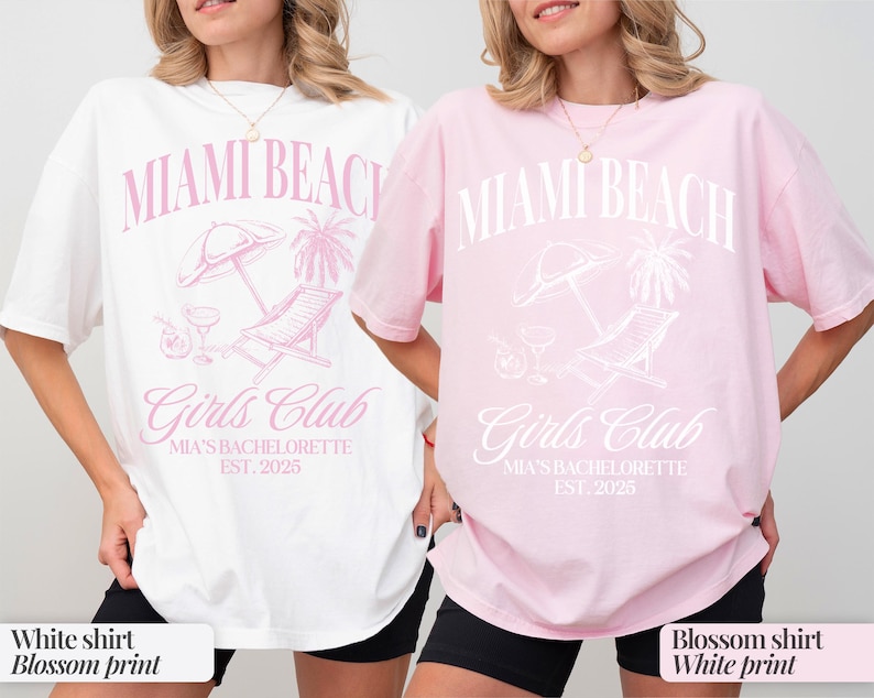 May include: Two white t-shirts with a pink graphic print that says "Miami Beach Girls Club Mia's Bachelorette Est. 2025". One shirt is white with pink print and the other is pink with white print.