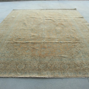 Vintage Turkish Rug, Distressed Floral Pattern, Muted Earth Tones, Classic Oriental Design, 10x14ft Area Carpet