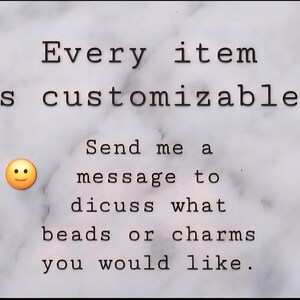 May include: Image with text: "Every item is customizable. Send me a message to discuss what beads or charms you would like." A smiling face emoji is also included. The background has a marble-like pattern.