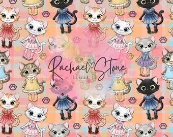 May include: A seamless pattern featuring a variety of cute cartoon cats wearing different outfits. The cats are on a pink and blue plaid background with paw prints. The text "Rachael Stone Design Co." is in the center of the pattern.