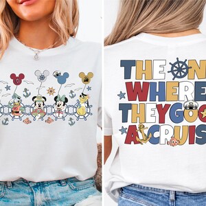 a woman wearing a mickey mouse t - shirt