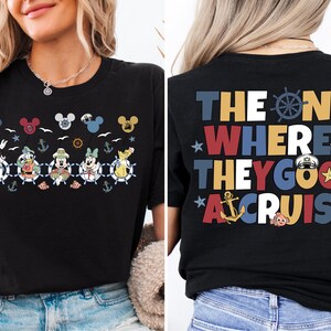 a woman wearing a mickey mouse t - shirt