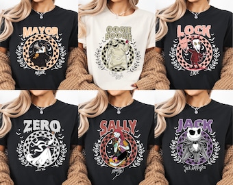 May include: Six graphic t-shirts featuring characters from a movie. Designs include "Mayor", "Oogie Boogie", "Lock", "Zero", "Sally", and "Jack". Each design is set within a circular frame with a checkered pattern and botanical elements.