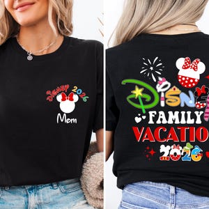 a woman wearing a black t-shirt with Disney-themed graphics and text.