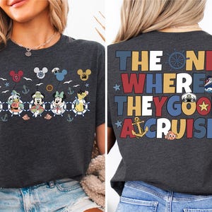 a woman wearing a mickey mouse t - shirt