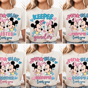 May include: Six white t-shirts with a pink and blue Mickey Mouse and Minnie Mouse design. The text on the shirts reads "Pink or Blue" and includes the words "Sister", "Mommy", "Brother", "Grandma", "Daddy", and "Keeper of the Gender".