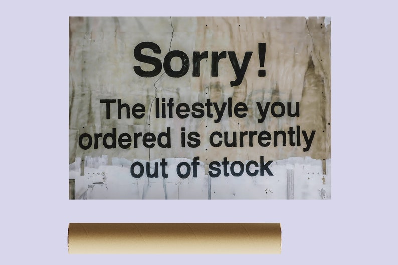 May include: A distressed, white, rectangular sign with black text that reads "Sorry! The lifestyle you ordered is currently out of stock."