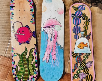 Hand painted, mixed medium skateboard deck - Goldfish