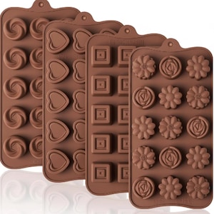 May include: Four brown silicone molds with various shapes: swirls, hearts, squares, flowers, and rose designs. Each mold has multiple cavities for creating chocolates, candies, or other treats. The molds are flexible and have a small hole for hanging.