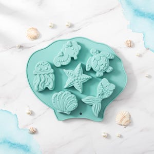 Molde de silicone para decoração oceânica – Cauda de sereia, concha, cavalo-marinho e estrela-do-mar (fondant, chocolate e resina).