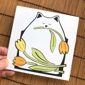 Cute white cat design. Yellow, orange Tulips. Mothers/greetings card. Spring. Blank inside. Print of original papercut artwork. 148x148 mm.