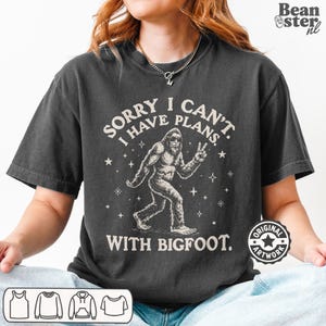 I Can't I Have Plans With Bigfoot Shirt | Funny Big Foot Tshirt, Cryptid Humor Gift, Sasquatch Graphic Comfort Colors Tee Pepper