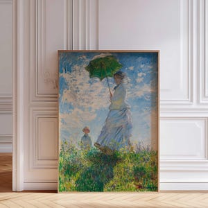 May include: A painting of a woman in a white dress holding a green umbrella, walking in a field with a child. The sky is blue with white clouds.