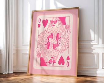 May include: A pink playing card featuring the Queen of Hearts. The queen is wearing sunglasses and holding a flower. The card has a pink background with a white and pink pattern.
