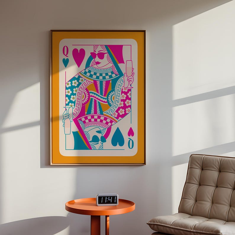 May include: A colorful illustration of the Queen of Hearts playing card. The queen is wearing sunglasses and holding a glass of champagne. The card is set against a yellow background.