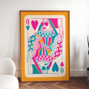 May include: A colorful illustration of the Queen of Hearts playing card. The queen is wearing sunglasses and holding a glass of champagne. The card is set against a yellow background.