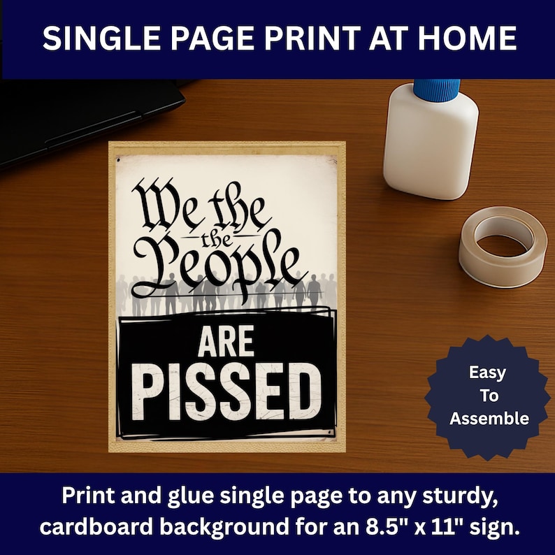 May include: A framed print with the words "We the People ARE PISSED" in black and white. The print is designed to be printed at home and glued to a 21.6 cm x 27.9 cm cardboard background. A bottle of glue and tape are next to the print.