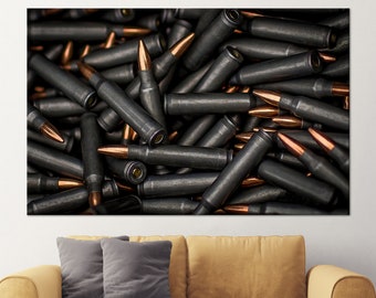 May include: A close-up image of a pile of black and copper-colored bullets.