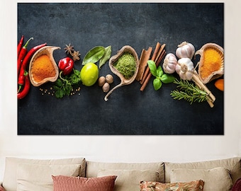 May include: A flat lay image of various spices and herbs on a dark grey background. The ingredients include red chili peppers, green chilies, garlic cloves, cinnamon sticks, bay leaves, rosemary sprigs, and dried herbs in small bowls.