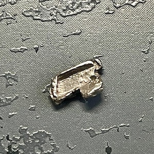 Rare Platinum crystal from Konder, 7 mm, 0.42 grams
