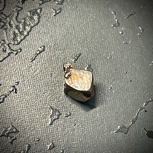 Rare Platinum crystal with some gold  from Konder, 4.2 mm, 0.22 grams