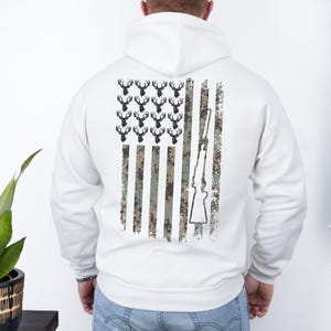 Warm hoodie with hunting-inspired camo print, great for outdoor cold-weather activities.