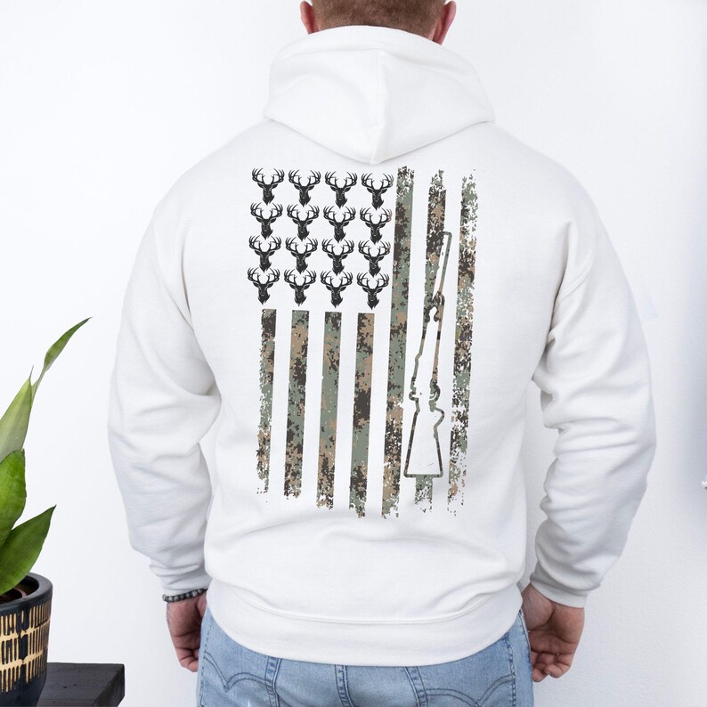 Warm hoodie with hunting-inspired camo print, great for outdoor cold-weather activities.