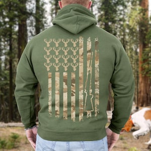 Patriotic hunting hoodie with deer camo flag design, perfect gift for dads or husbands who live for hunting season.