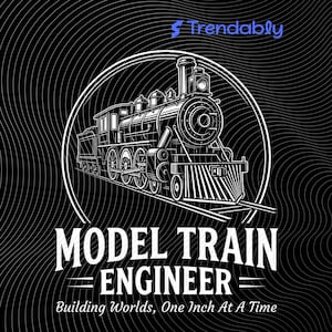 May include: A monochrome illustration of a model train within a white circle, with the text "MODEL TRAIN ENGINEER" and "Building Worlds, One Inch At A Time". The background is black with white curved lines.