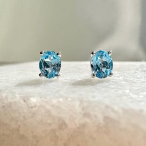 Genuine Blue Topaz Oval Cut Solitaire Stud Earrings / 14k Solid Gold