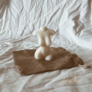 soy wax candles in the shape of a scented female body ideal for decorating a room or as a gift