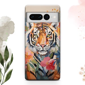 May include: A phone case with a colorful illustration of a tiger surrounded by flowers. The tiger has orange, black, and white stripes. The flowers are pink, yellow, and blue.