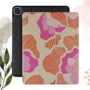 May include: A beige iPad case with a colorful abstract floral pattern. The pattern features pink, orange, and white flowers with a striped design.