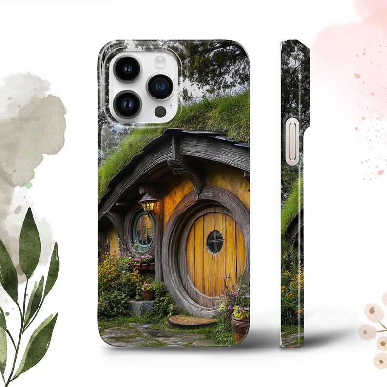 May include: A phone case with a green, brown, and yellow hobbit house with a round door and a window. The house is surrounded by green grass and flowers.