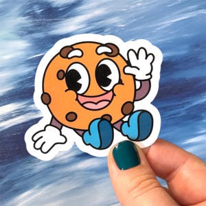 Waving Cookie Sticker – Cute Food Decal for Laptops & Water Bottles | Waterproof Vinyl | Handmade