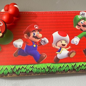 Portefeuille Mario rouge et bracelet assorti