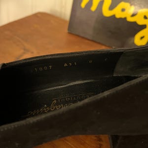 Vintage Salvatore Ferragamo Boutique Black Suede Loafer Pumps | 90s Square Toe Block Heel | Braided Rope Tassel Shoes | Size 8 
Made in Italy

A gorgeous pair of Salvatore Ferragamo Boutique loafers!  Deep saturated black suede (nubuck) finish and a distinctive braided rope tassel detail on top of black elastic vamp. Sophisticated tassel detail and streamlined silhouette, blocked heel and iconic square toe. Genuine Suede Upper, Leather
Made in Italy In Excellent Vintage Condition.