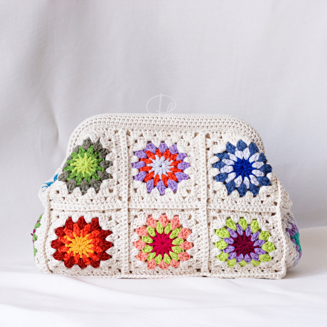 OVERSIZED CLUTCH WITH CHAIN PATCHWORK POETRY