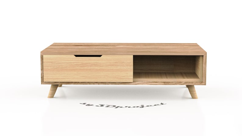 May include: A light wood coffee table with a drawer and a shelf. The table has a simple, modern design with tapered legs.