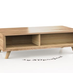 May include: A light wood coffee table with two open shelves and four short legs. The table is made of light wood with a natural finish.