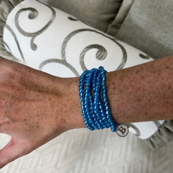 The Wrap! Blue. A 4 in 1 Jewelry piece! 2 Necklaces, an Anklet, and a Bracelet all in one! Stretchy! Wrist size 5-7in.