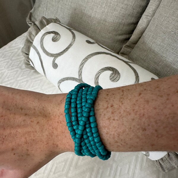 The Wrap! Aqua Marine. A 4 in 1 Jewelry piece! 2 Necklaces, an Anklet, and a Bracelet all in one! Stretchy! Wrist size 5-7in.