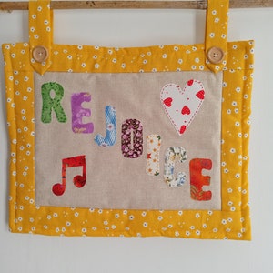 Handmade personalised patchwork wall hangings; Wording to order - popular are: Shalom; Welcome; Rejoice; Hope; Joy; Love; personalised names