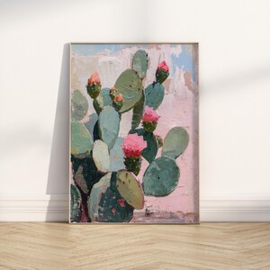 May include: A painting of a cactus with pink flowers on a pink background. The cactus is green and has many spines. The painting is done in a loose, impressionistic style.